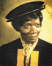 A photograph of Kofoworola Abeni Pratt smiling in graduation hat and gown